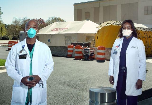 Masked providers at vaccination site