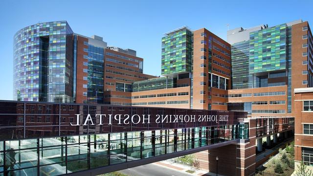 A wide shot of the exterior of the main Johns Hopkins Hospital East Baltimore campus